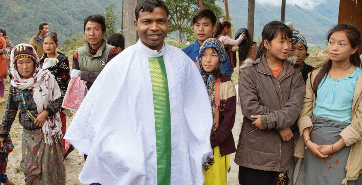 Ein Priester im Globalen Süden